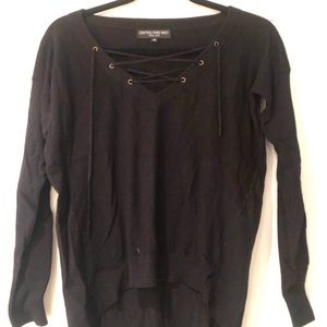 Central Park West sweater with ties on the chest